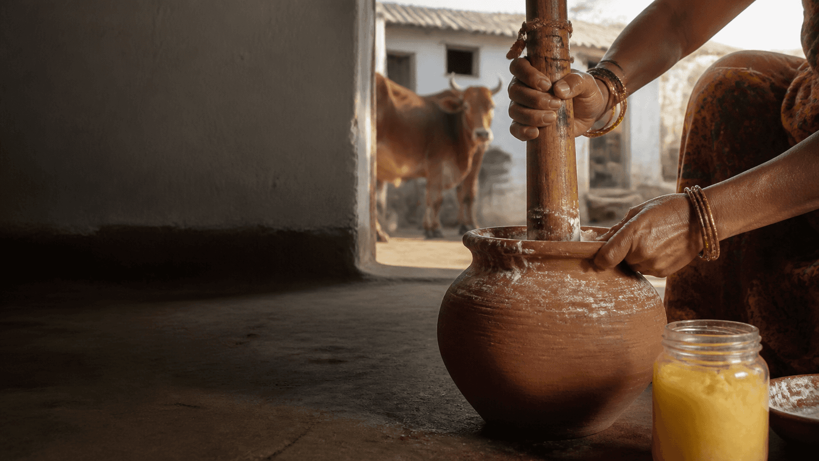 Traditional wooden bilona used to make A2 Gir Cow Ghee in Jaipur